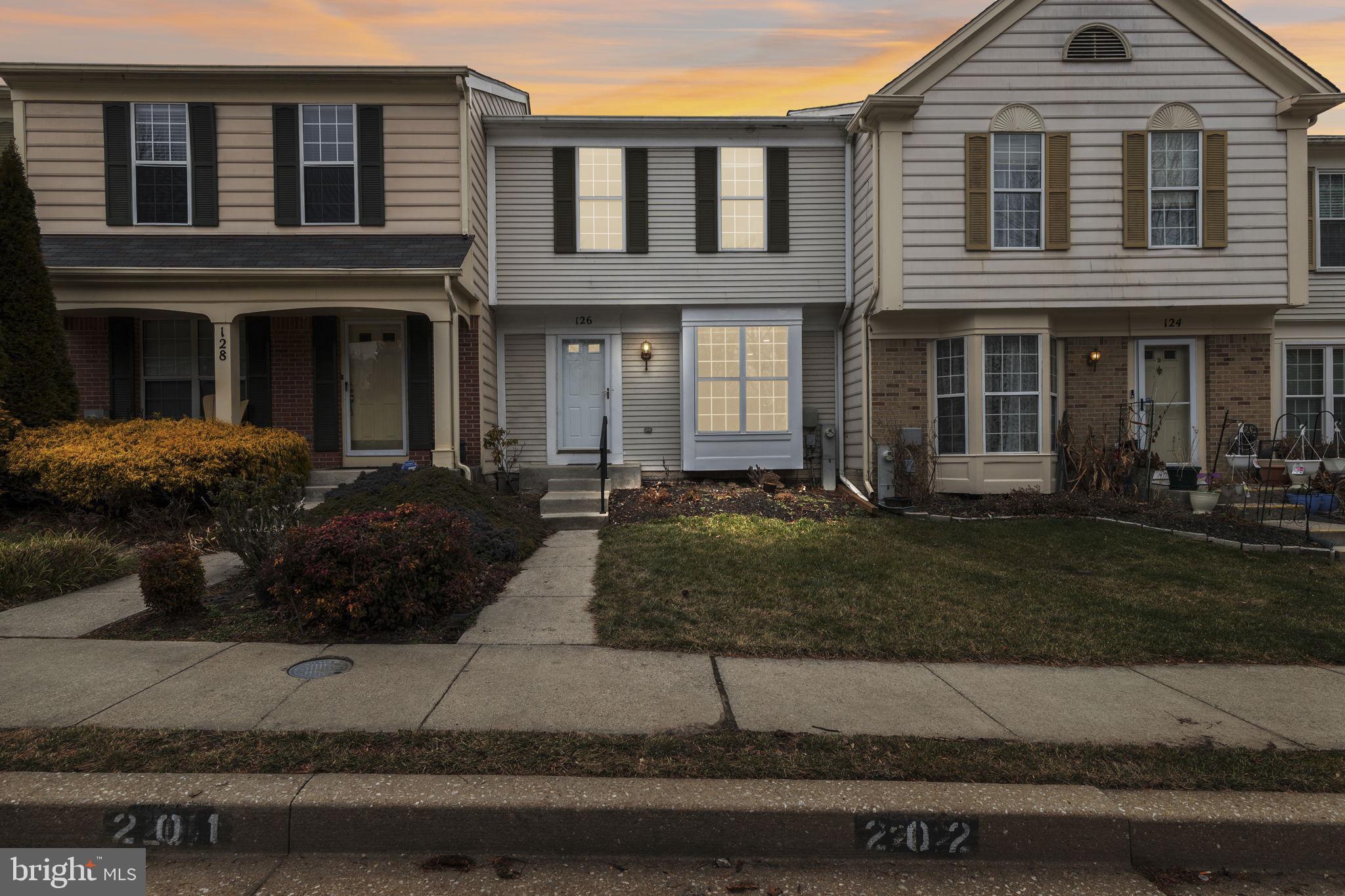 126 Gentlebrook Road Owings Mills, MD 21117 - Photo 2 of 30 a large brick building with many windows