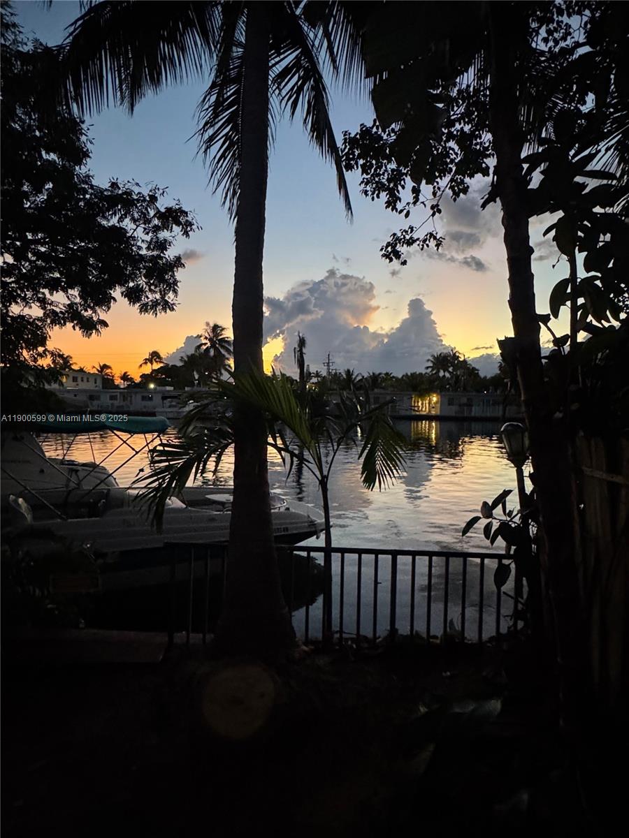 8300 Byron Avenue, Unit 5 Miami Beach, FL 33141 - Photo 2 of 12 a view of lake from a balcony