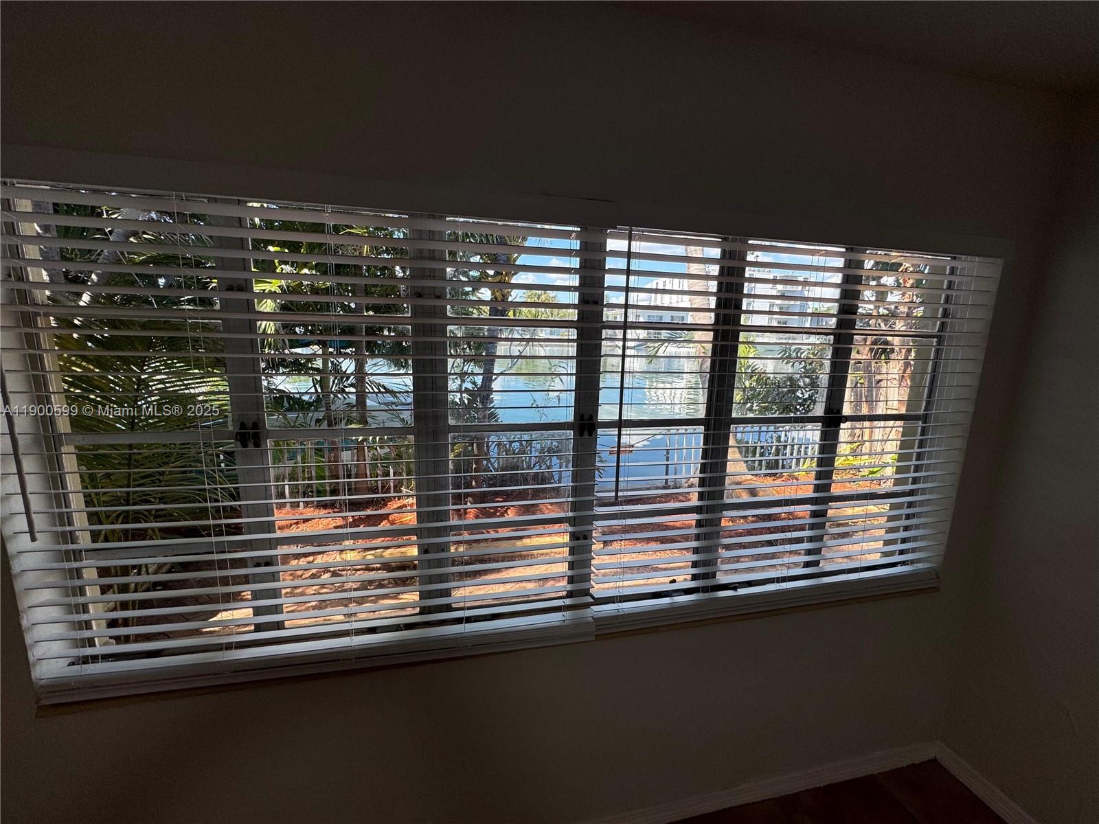 8300 Byron Avenue, Unit 5 Miami Beach, FL 33141 - Photo 7 of 12 a view of a balcony from a window