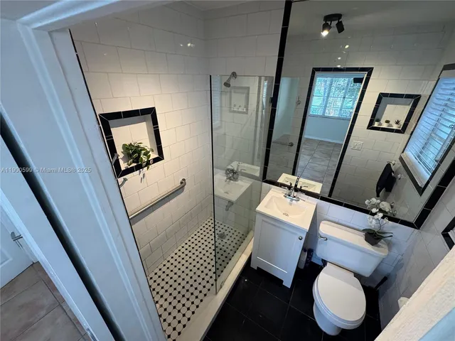 a backyard of a house with seating space