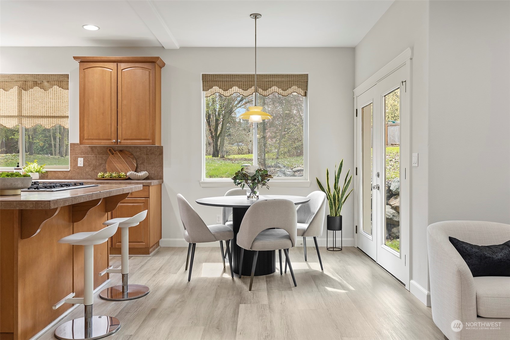 202 199th Street Southwest Bothell, WA 98012 - Photo 13 of 30 a dining room with furniture window wooden floor