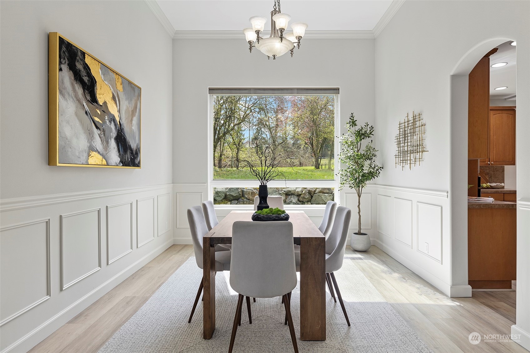 202 199th Street Southwest Bothell, WA 98012 - Photo 15 of 30 a view of a dining room with furniture a chandelier and wooden floor
