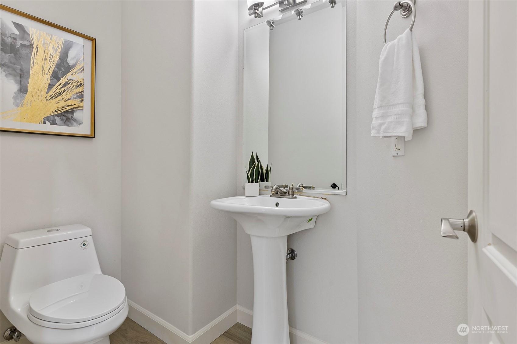 202 199th Street Southwest Bothell, WA 98012 - Photo 17 of 30 a bathroom with a toilet sink and mirror