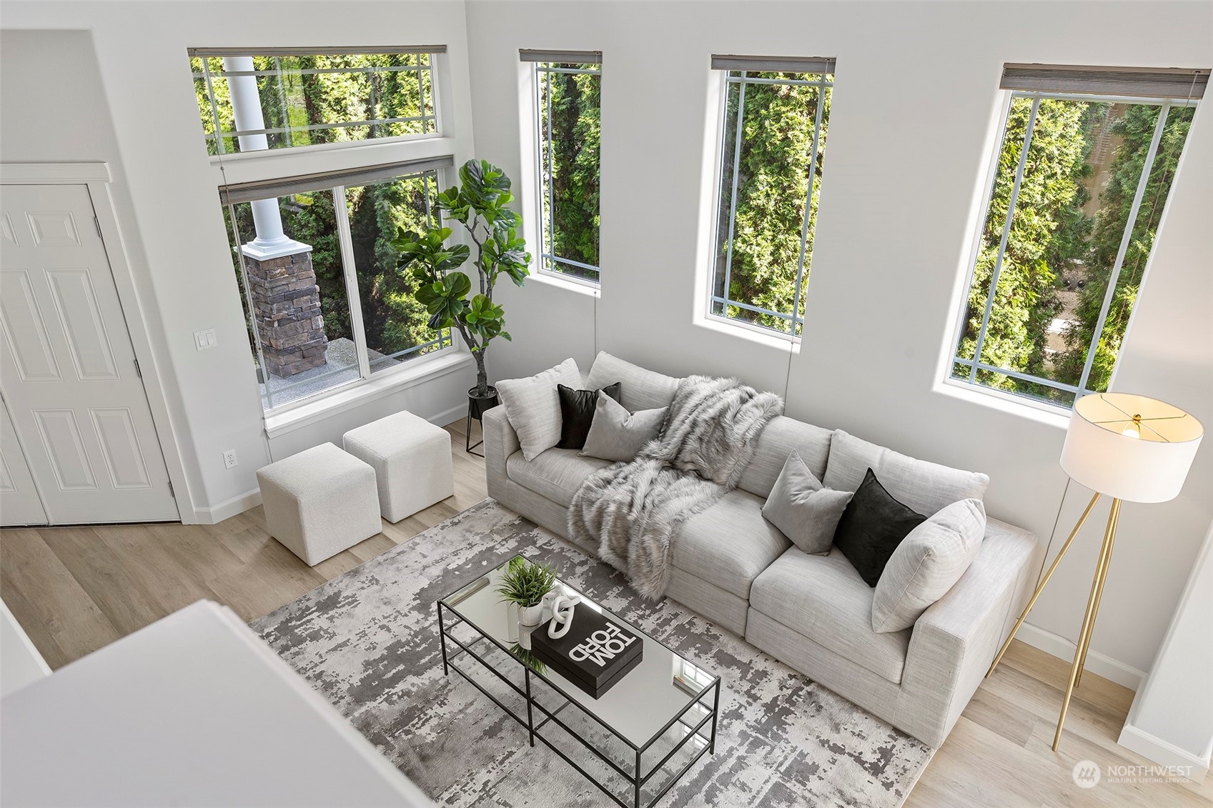 202 199th Street Southwest Bothell, WA 98012 - Photo 19 of 30 a living room with furniture and a window