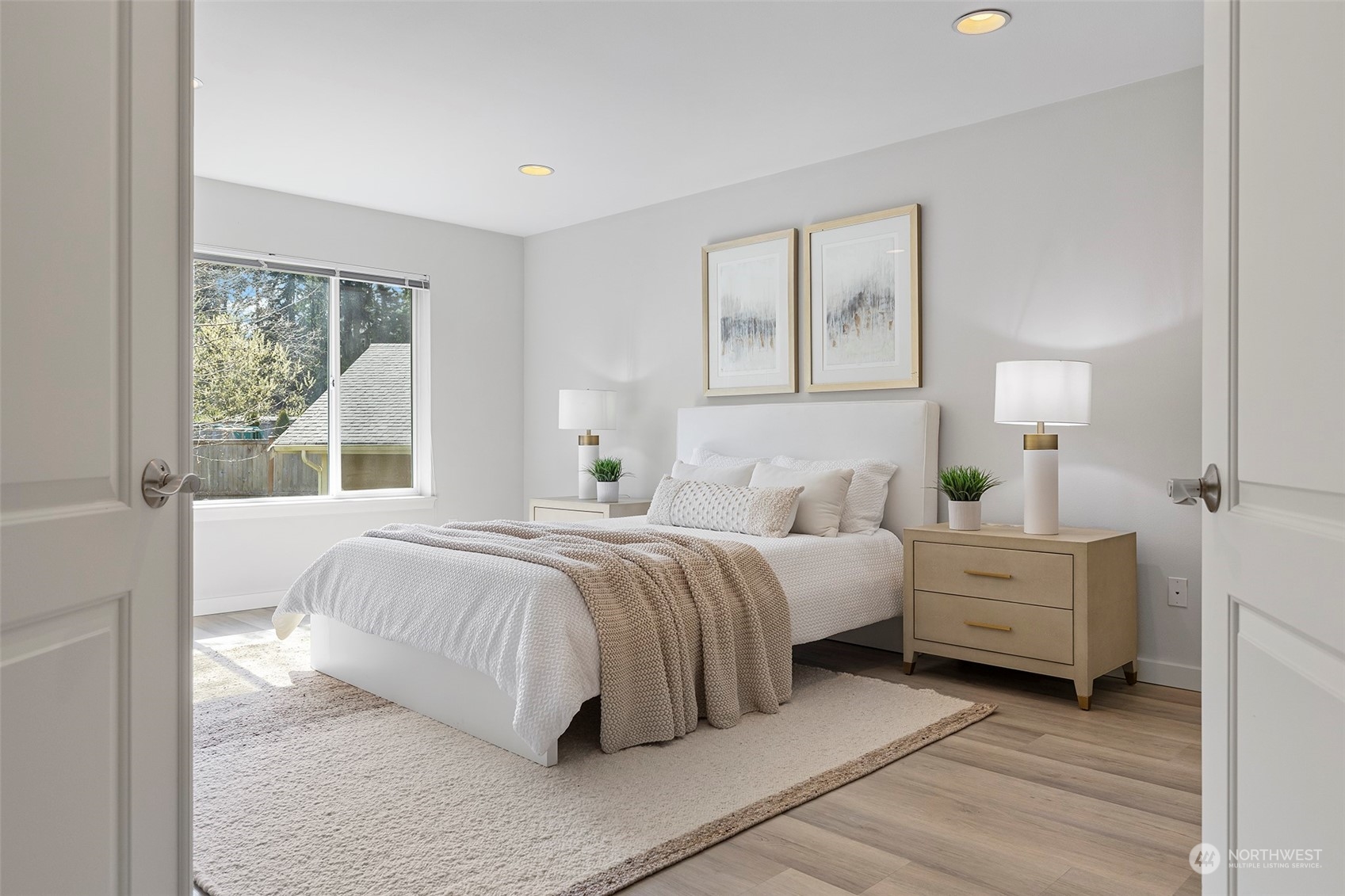 202 199th Street Southwest Bothell, WA 98012 - Photo 20 of 30 a bedroom with a bed and a night stand