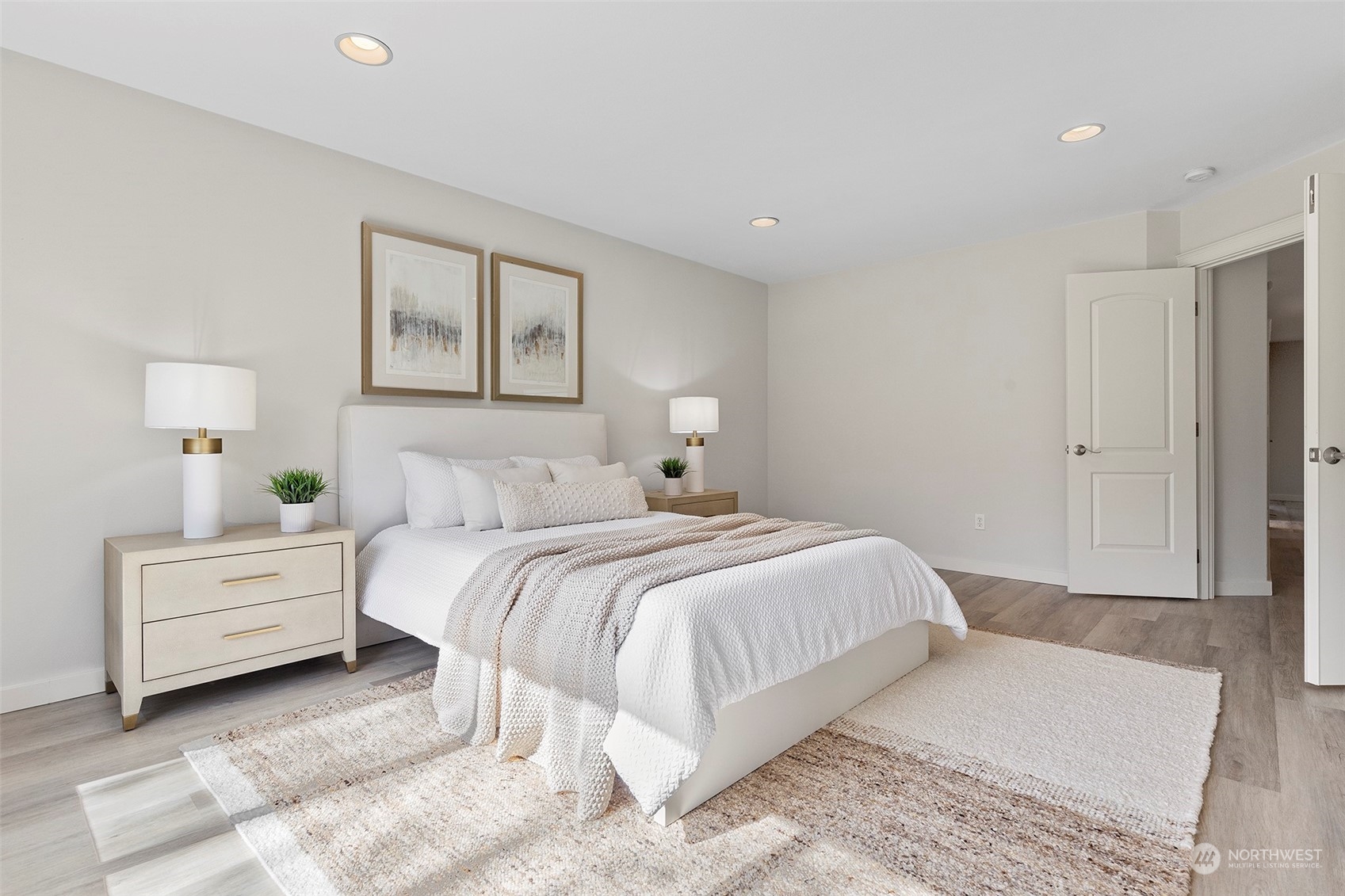 202 199th Street Southwest Bothell, WA 98012 - Photo 21 of 30 a bedroom with a bed and a painting