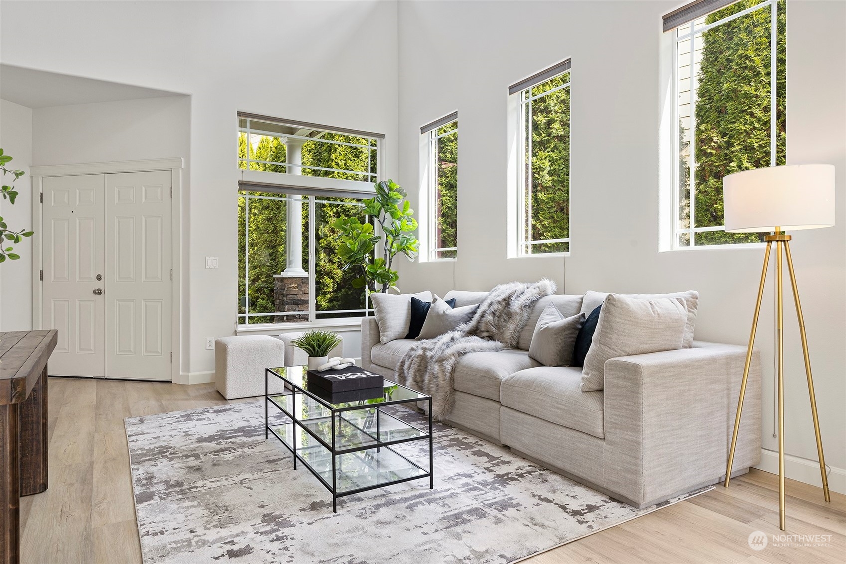 202 199th Street Southwest Bothell, WA 98012 - Photo 5 of 30 a living room with furniture and a large window