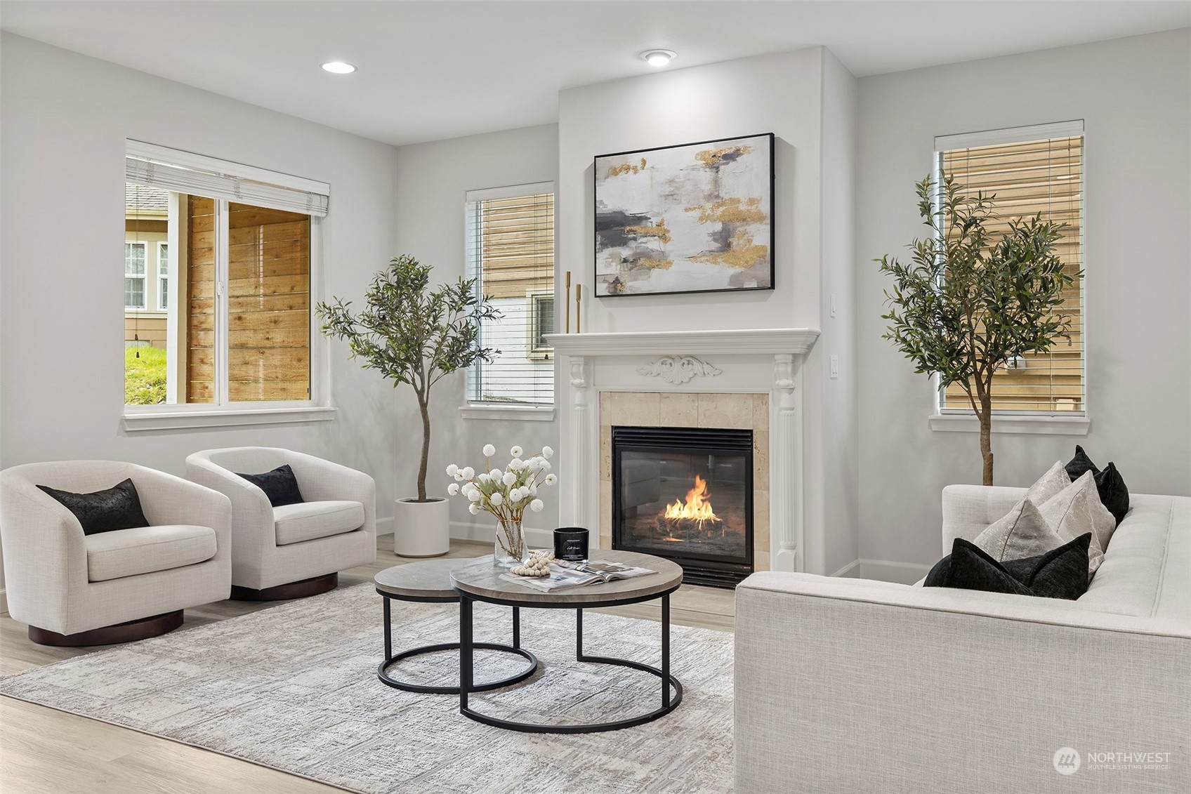 202 199th Street Southwest Bothell, WA 98012 - Photo 6 of 30 a living room with furniture and a fireplace