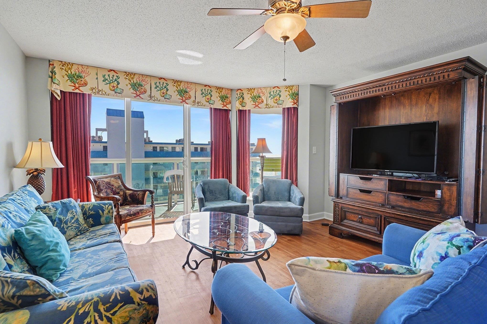 1707 Perrin Drive, Unit 701 North Myrtle Beach, SC 29582 - Photo 3 of 40 Living room with wood finished floors, a textured ceiling, and a ceiling fan