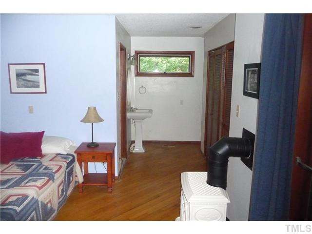 2522 Laine Road Chapel Hill, NC 27516 - Photo 15 of 22 a living room with furniture and a window
