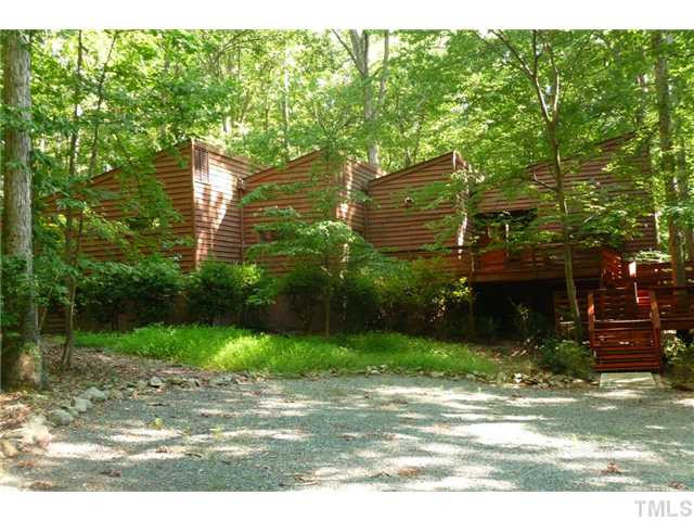 2522 Laine Road Chapel Hill, NC 27516 - Photo 2 of 22 a backyard of a house with lots of green space