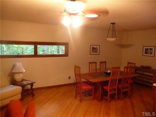 2522 Laine Road Chapel Hill, NC 27516 - Photo 7 of 22 a view of a dining room with furniture and wooden floor