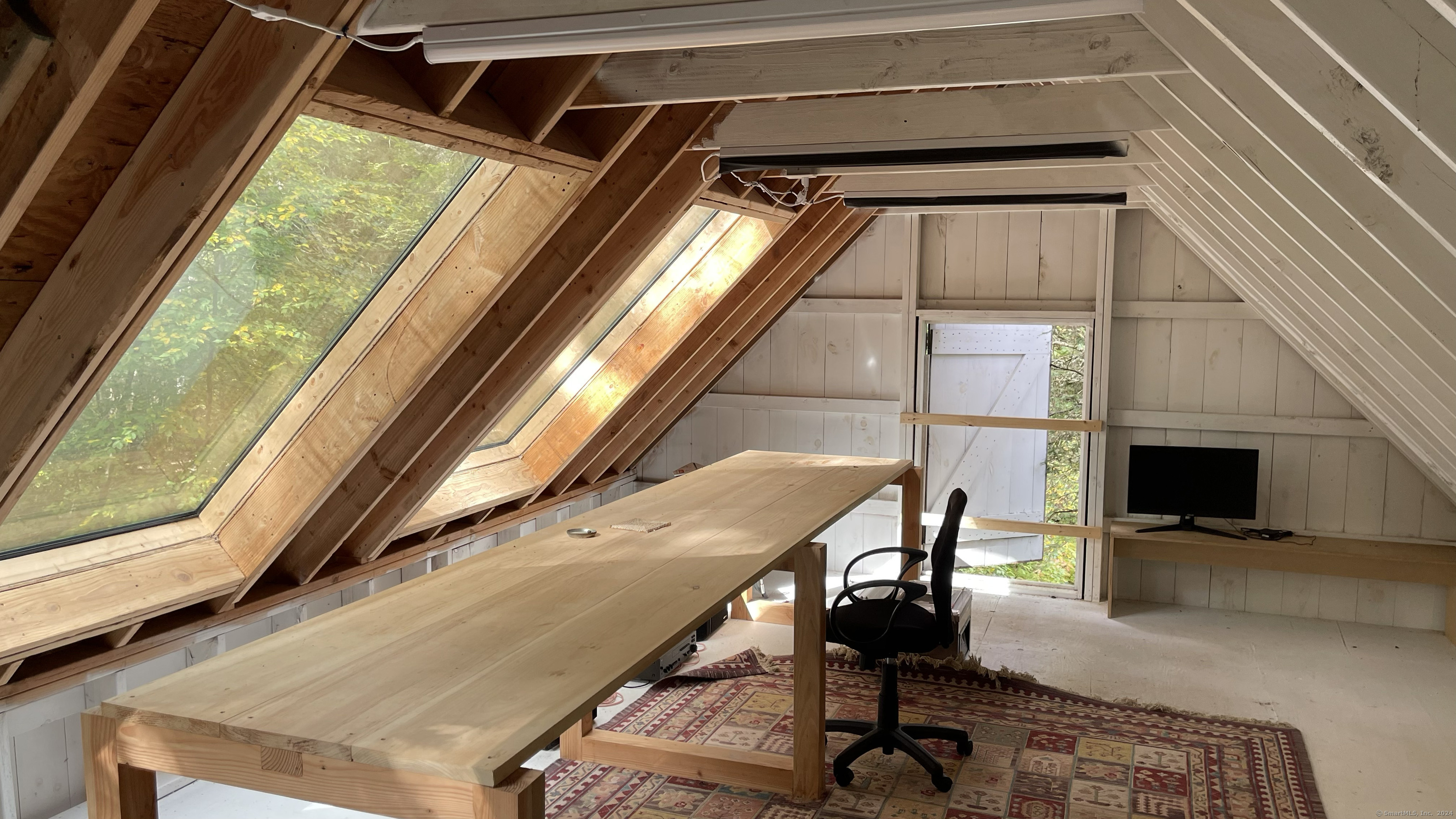 433 Segar Mountain Road Kent, CT 06785 - Photo 15 of 15 a view of balcony with wooden floor and furniture