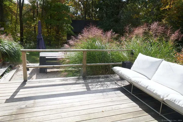 a view of a two chairs in the deck