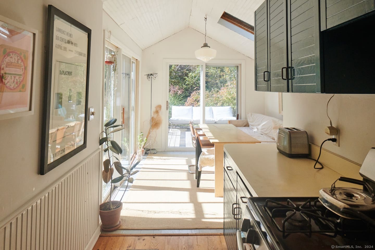 433 Segar Mountain Road Kent, CT 06785 - Photo 8 of 15 a living room with furniture and a flat screen tv