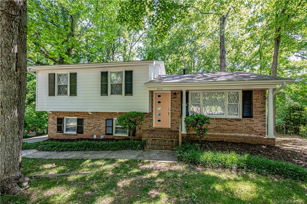 7415 Watercrest Road Charlotte, NC 28210 - Photo 1 of 35 front view of a house with a yard