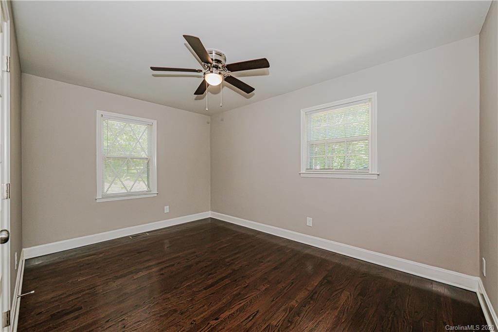 7415 Watercrest Road Charlotte, NC 28210 - Photo 17 of 35 a view of a room with wooden floor and windows