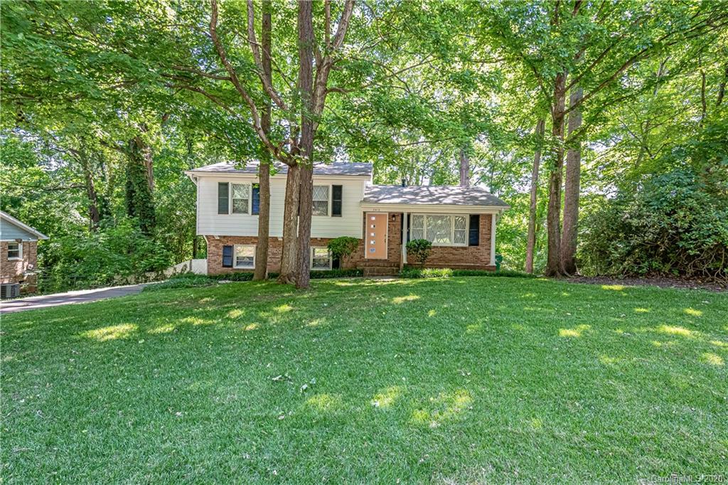 7415 Watercrest Road Charlotte, NC 28210 - Photo 34 of 35 a view of a house with backyard and garden