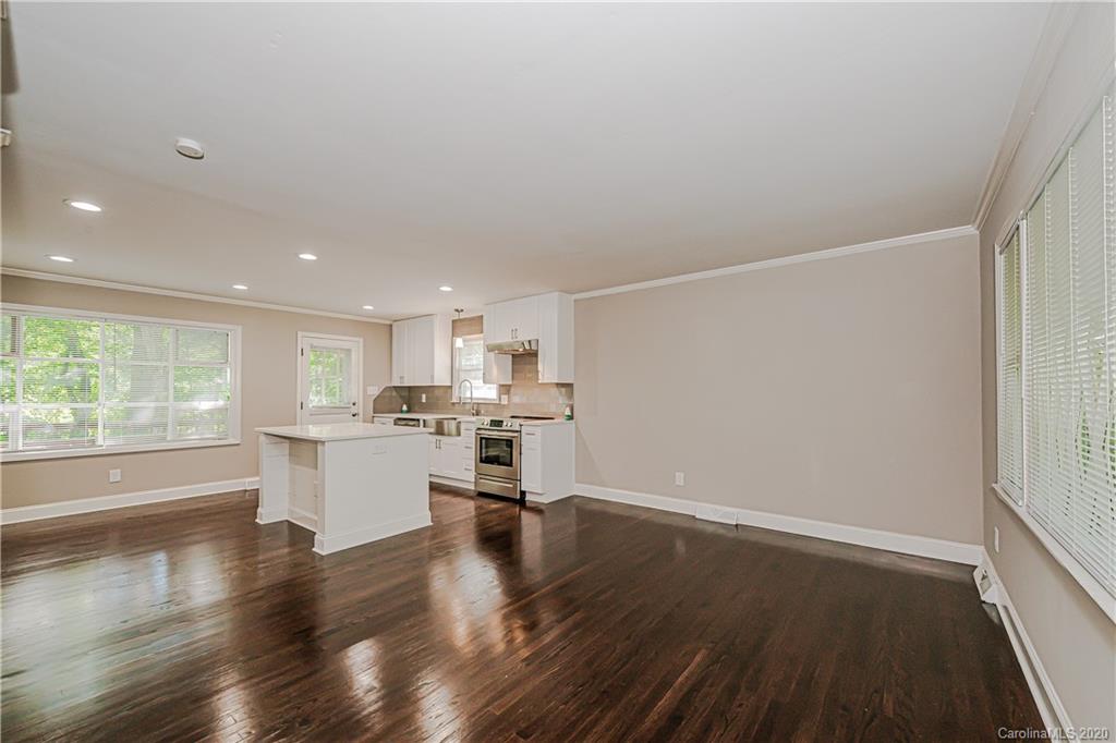 7415 Watercrest Road Charlotte, NC 28210 - Photo 7 of 35 a view of kitchen with wooden floor and electronic appliances