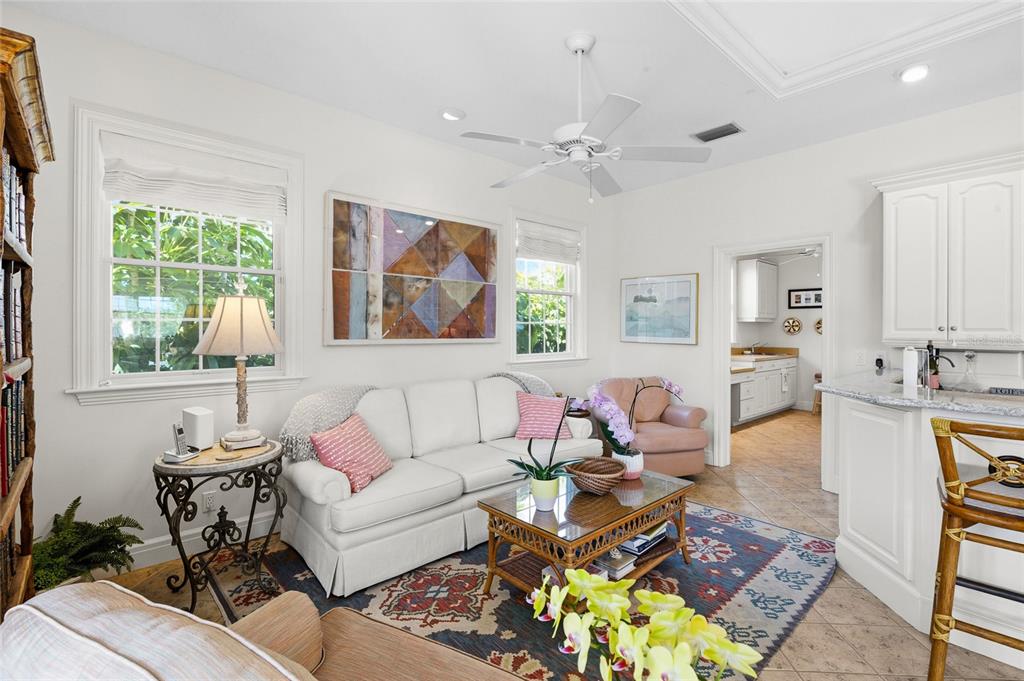162 Blackwall Court Boca Grande, FL 33921 - Photo 12 of 62 a living room with furniture and a large window