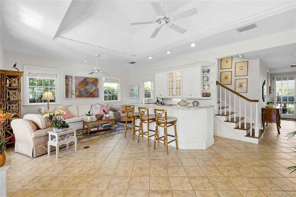 162 Blackwall Court Boca Grande, FL 33921 - Photo 13 of 62 a living room with furniture and a dining table with kitchen view