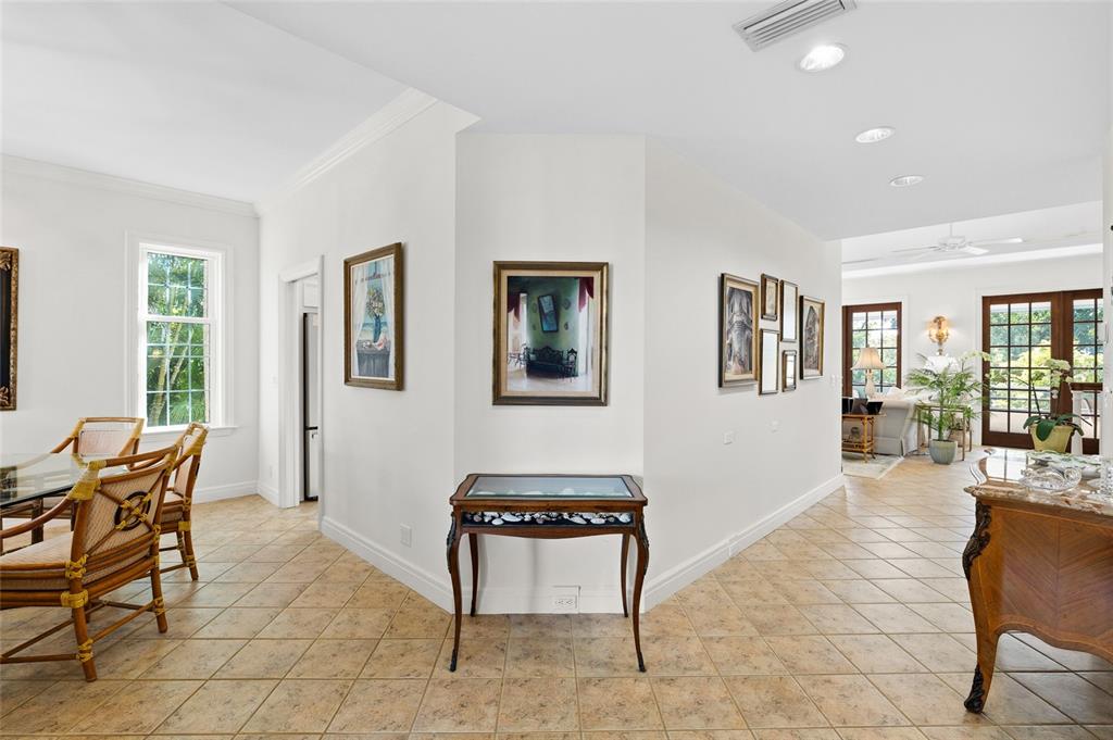 162 Blackwall Court Boca Grande, FL 33921 - Photo 15 of 62 a living room with furniture and a window