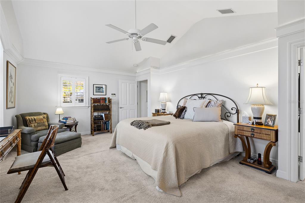 162 Blackwall Court Boca Grande, FL 33921 - Photo 29 of 62 a bedroom with a bed a desk and chair