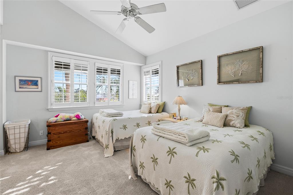 162 Blackwall Court Boca Grande, FL 33921 - Photo 34 of 62 a bedroom with bed and window