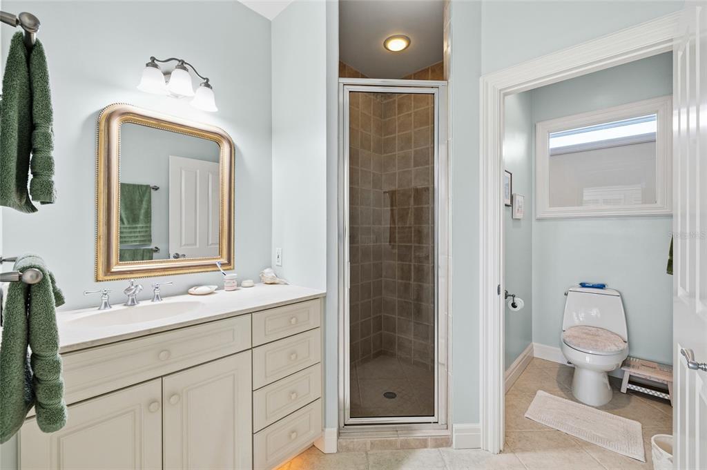 162 Blackwall Court Boca Grande, FL 33921 - Photo 36 of 62 a bathroom with a sink a toilet and shower