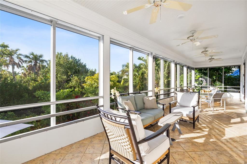 162 Blackwall Court Boca Grande, FL 33921 - Photo 4 of 62 a living room with furniture and a large window