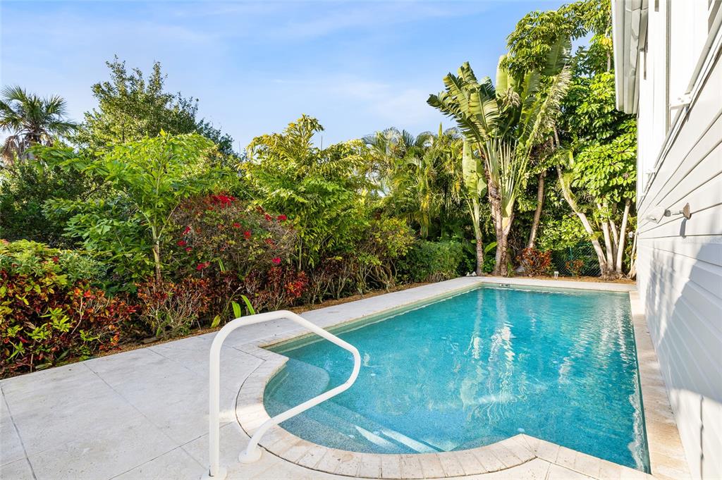 162 Blackwall Court Boca Grande, FL 33921 - Photo 44 of 62 a view of a swimming pool in a backyard