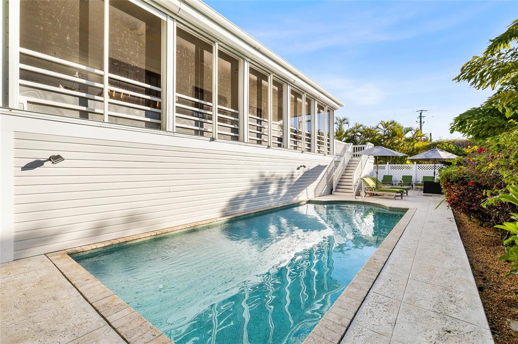 162 Blackwall Court Boca Grande, FL 33921 - Photo 45 of 62 a view of a swimming pool with sitting area