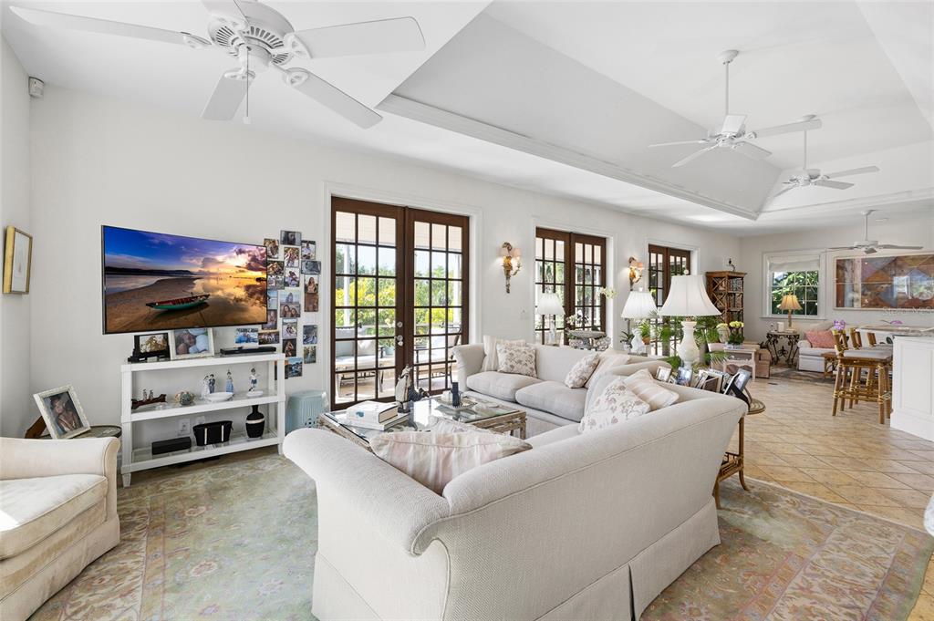 162 Blackwall Court Boca Grande, FL 33921 - Photo 10 of 62 a living room with furniture and a flat screen tv