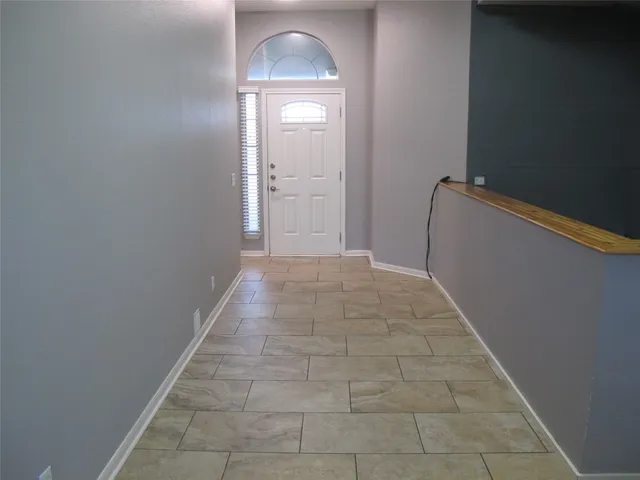 a view of a hallway with a elevator