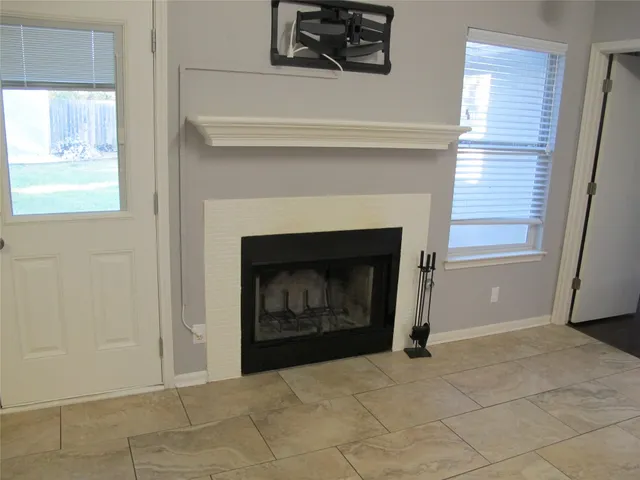 a living room with a fireplace