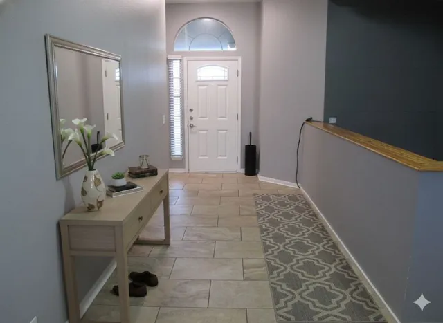 a bathroom with a sink and mirror