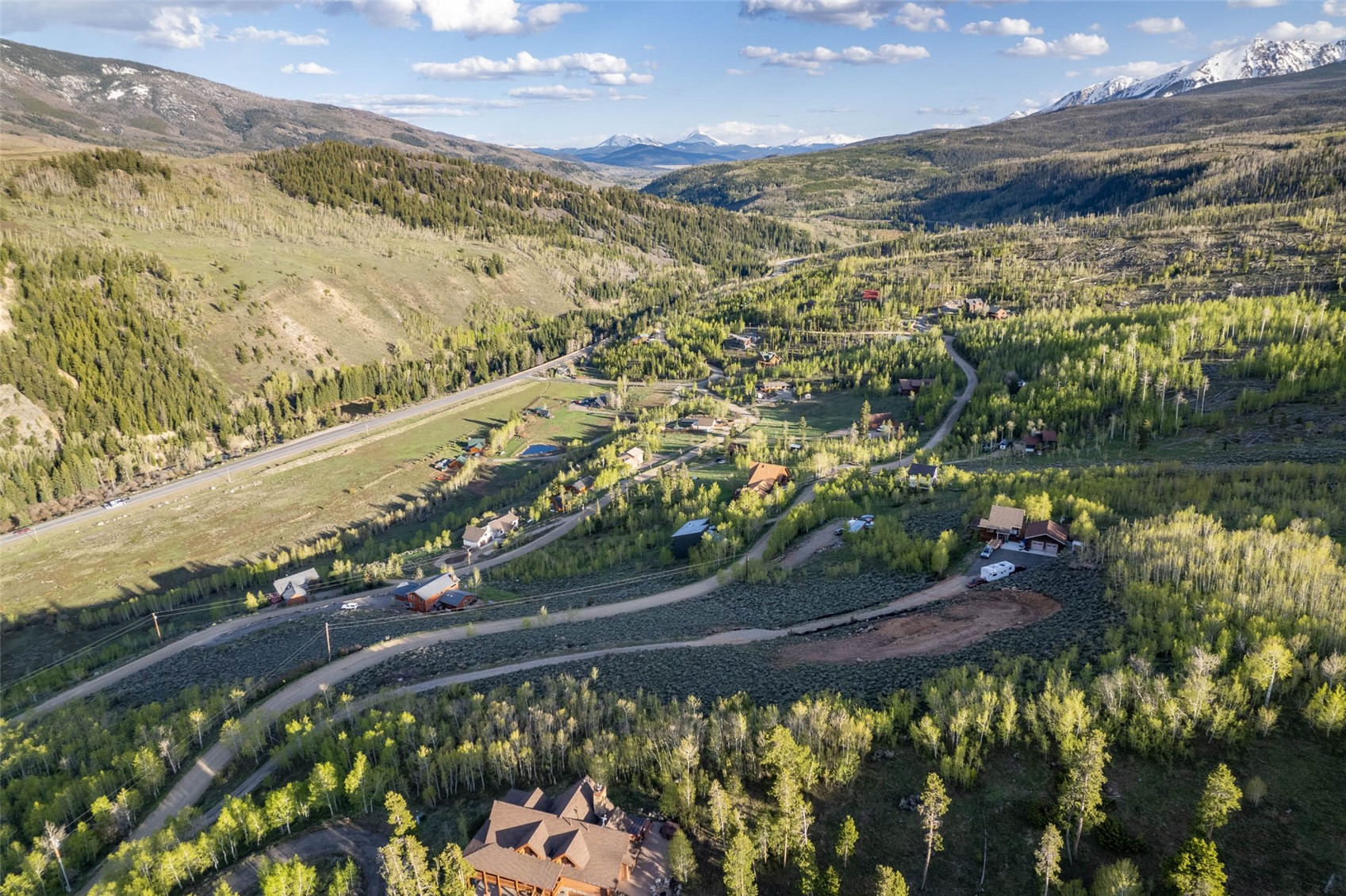 1116 Blue Ridge Road Silverthorne, CO 80498 - Photo 7 of 9 Drone / aerial view of a mountain backdrop and a forest