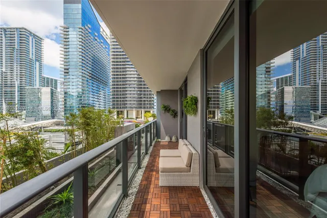 a view of balcony with potted plants