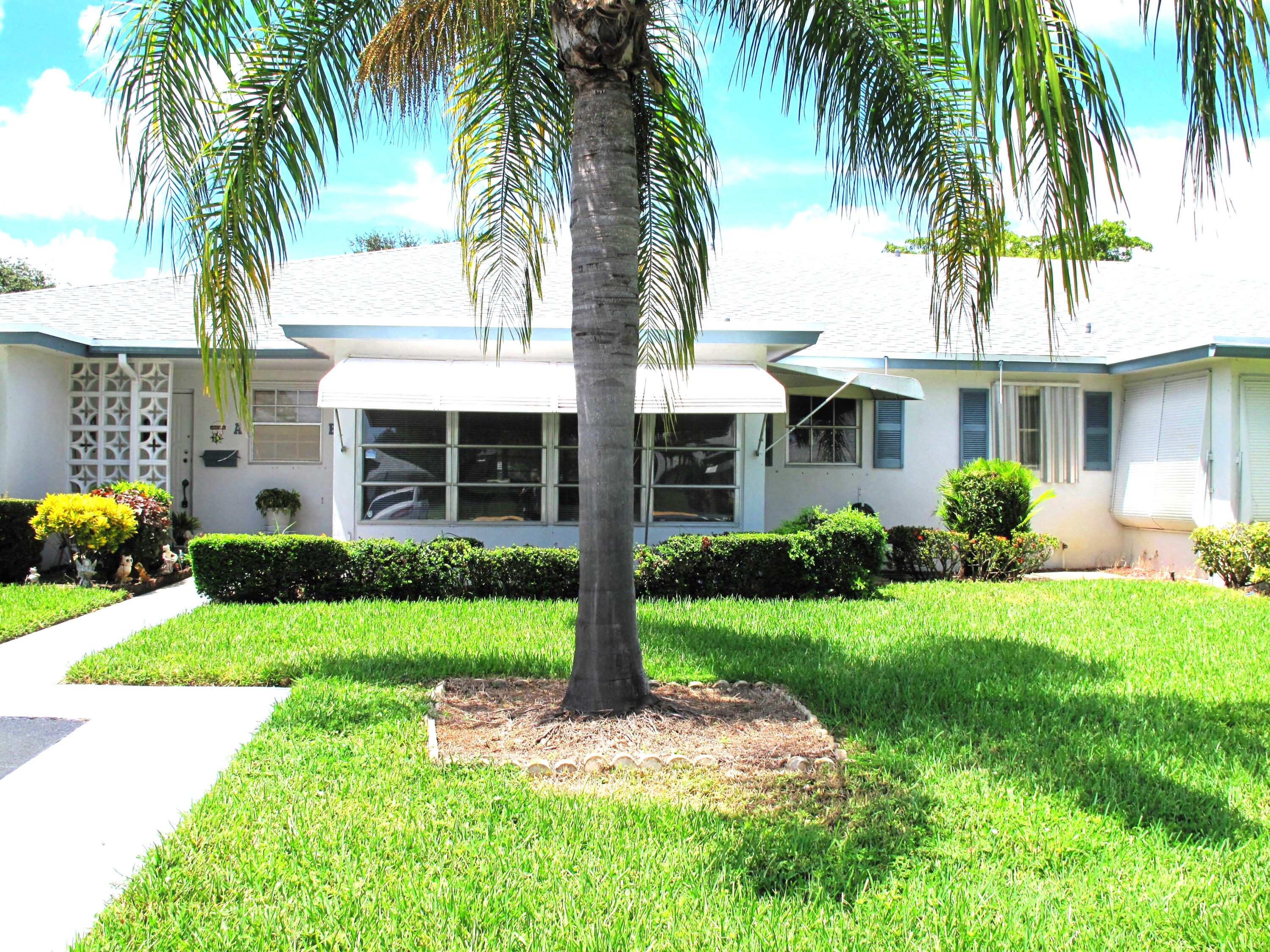 1202 South Drive Circle, Unit B Delray Beach, FL 33445 - Photo 1 of 57 Front view of villa