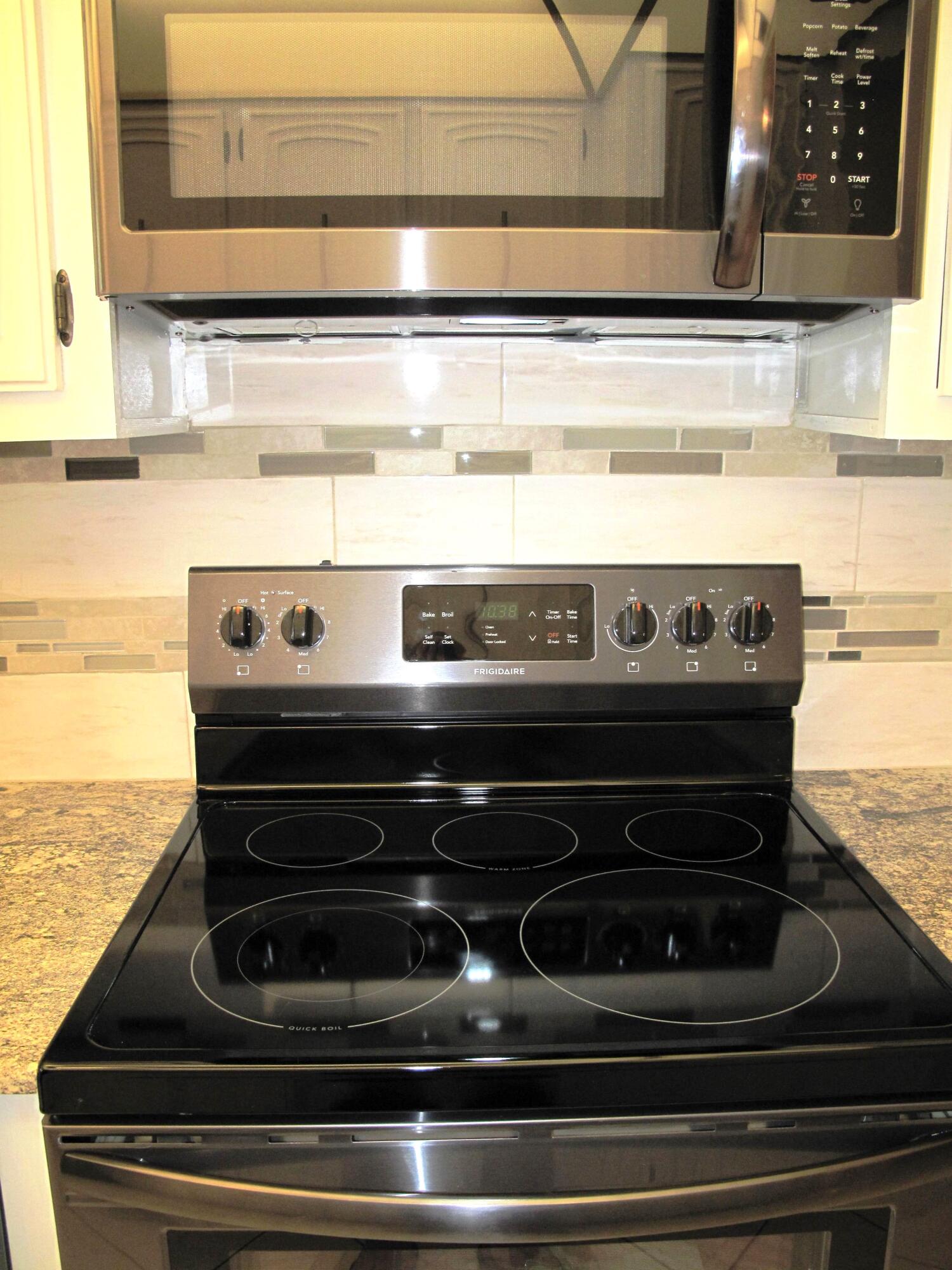 1202 South Drive Circle, Unit B Delray Beach, FL 33445 - Photo 15 of 57 New Black SS appliances with new garnite