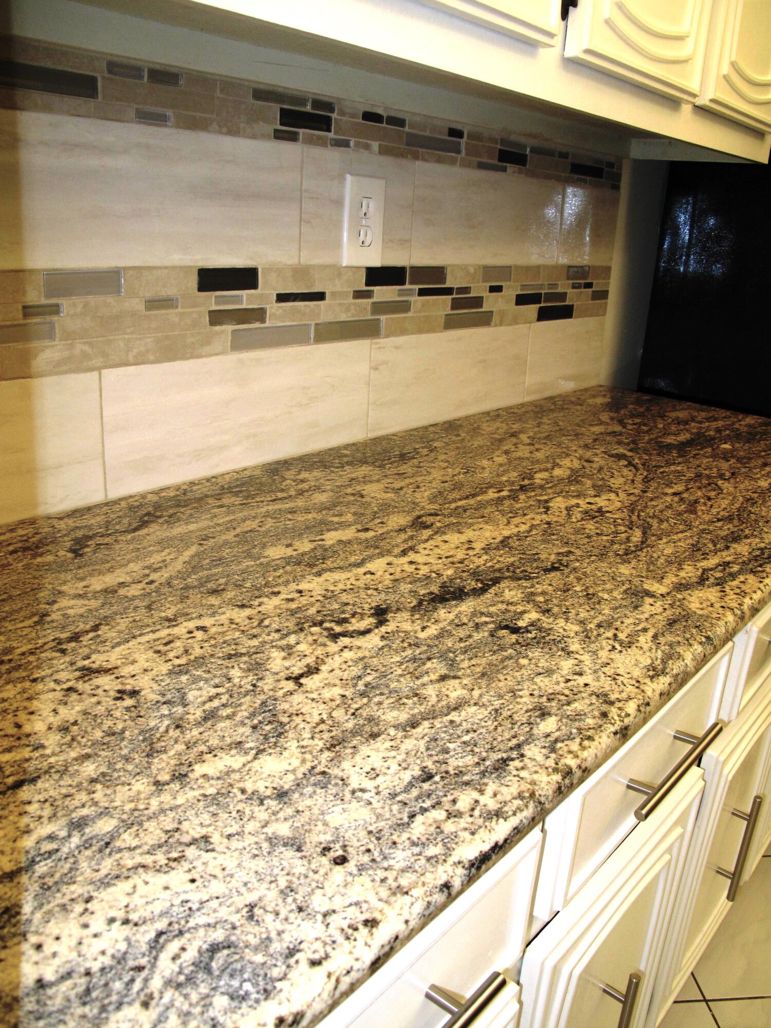 1202 South Drive Circle, Unit B Delray Beach, FL 33445 - Photo 16 of 57 New Black SS appliances with new garnite