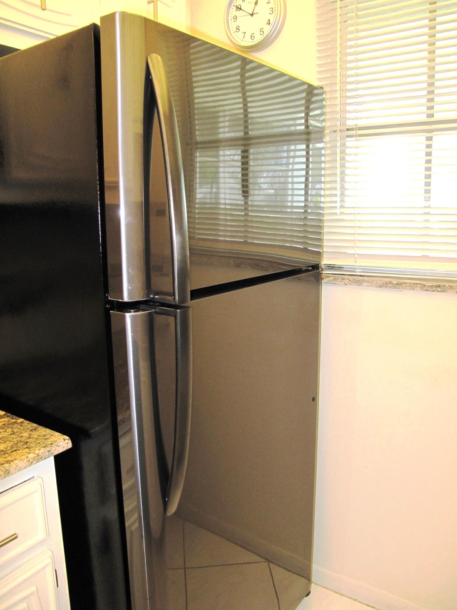1202 South Drive Circle, Unit B Delray Beach, FL 33445 - Photo 18 of 57 New Black SS appliances with new garnite