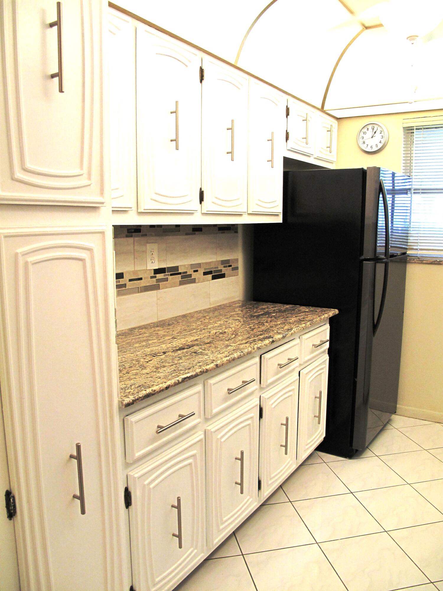 1202 South Drive Circle, Unit B Delray Beach, FL 33445 - Photo 23 of 57 Remodeled kitchen wtih granite counters