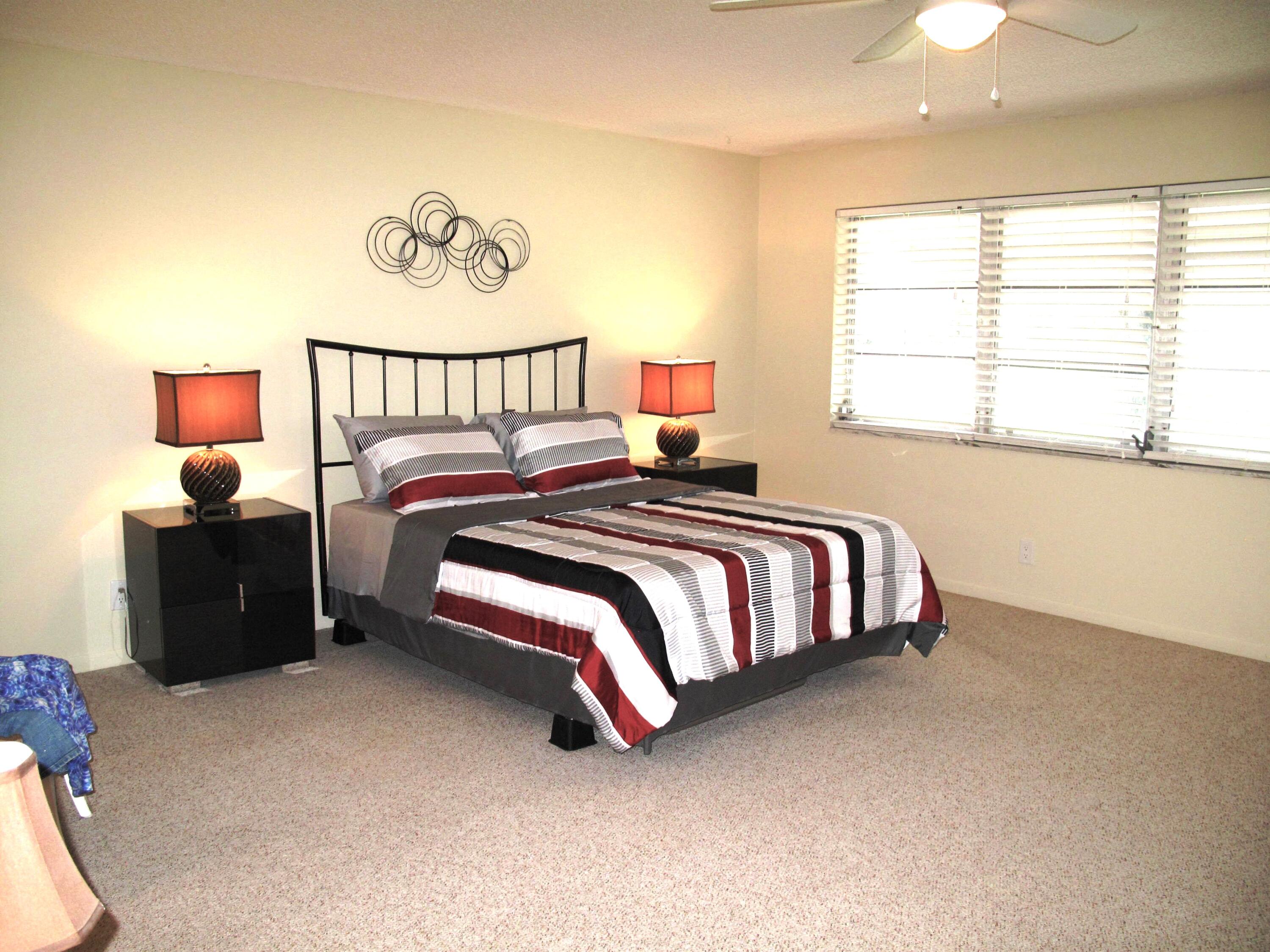 1202 South Drive Circle, Unit B Delray Beach, FL 33445 - Photo 29 of 57 Spacious master bedroom with 2 huge clos