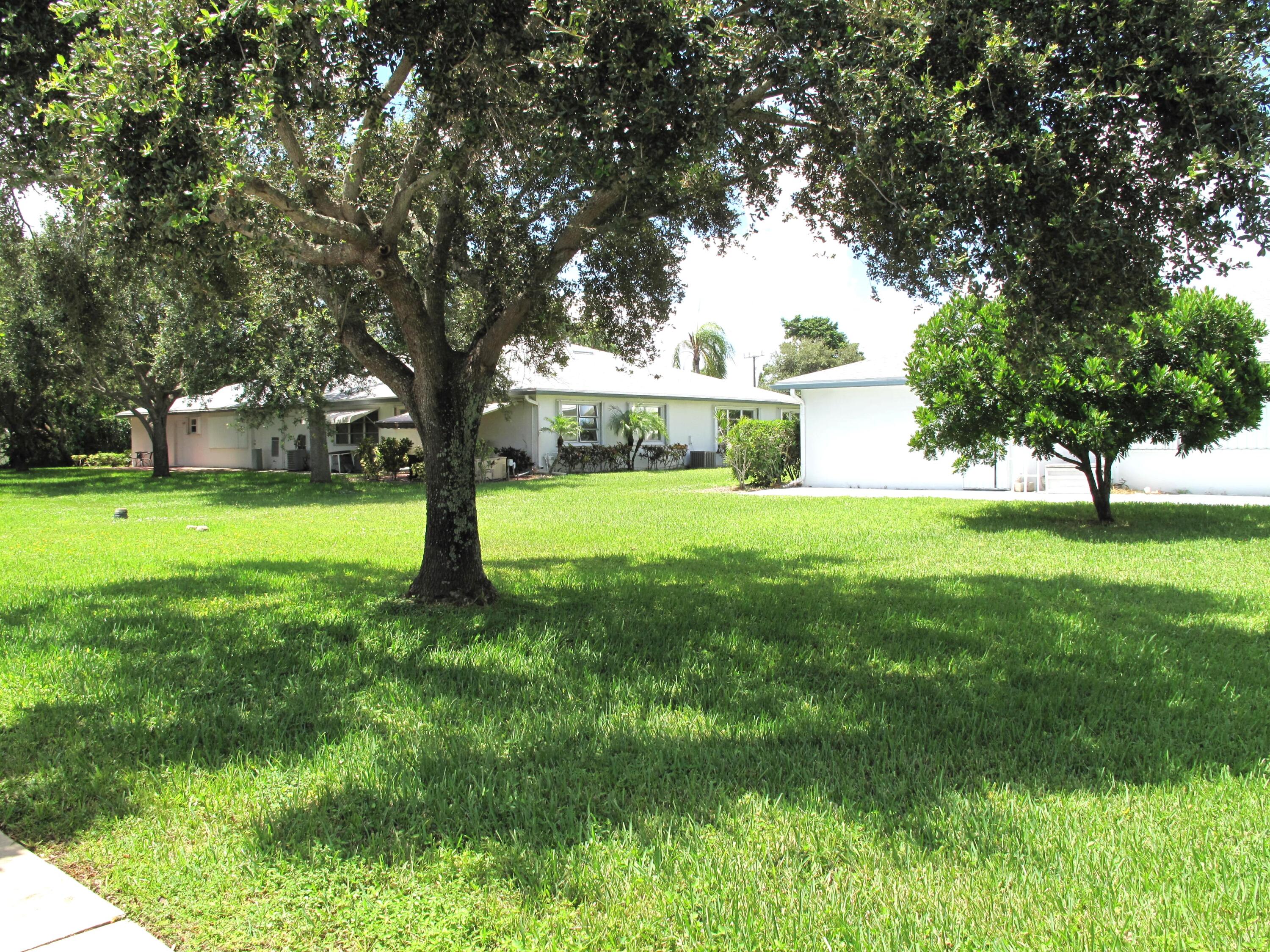 1202 South Drive Circle, Unit B Delray Beach, FL 33445 - Photo 42 of 57 Spacious back yard view (1)
