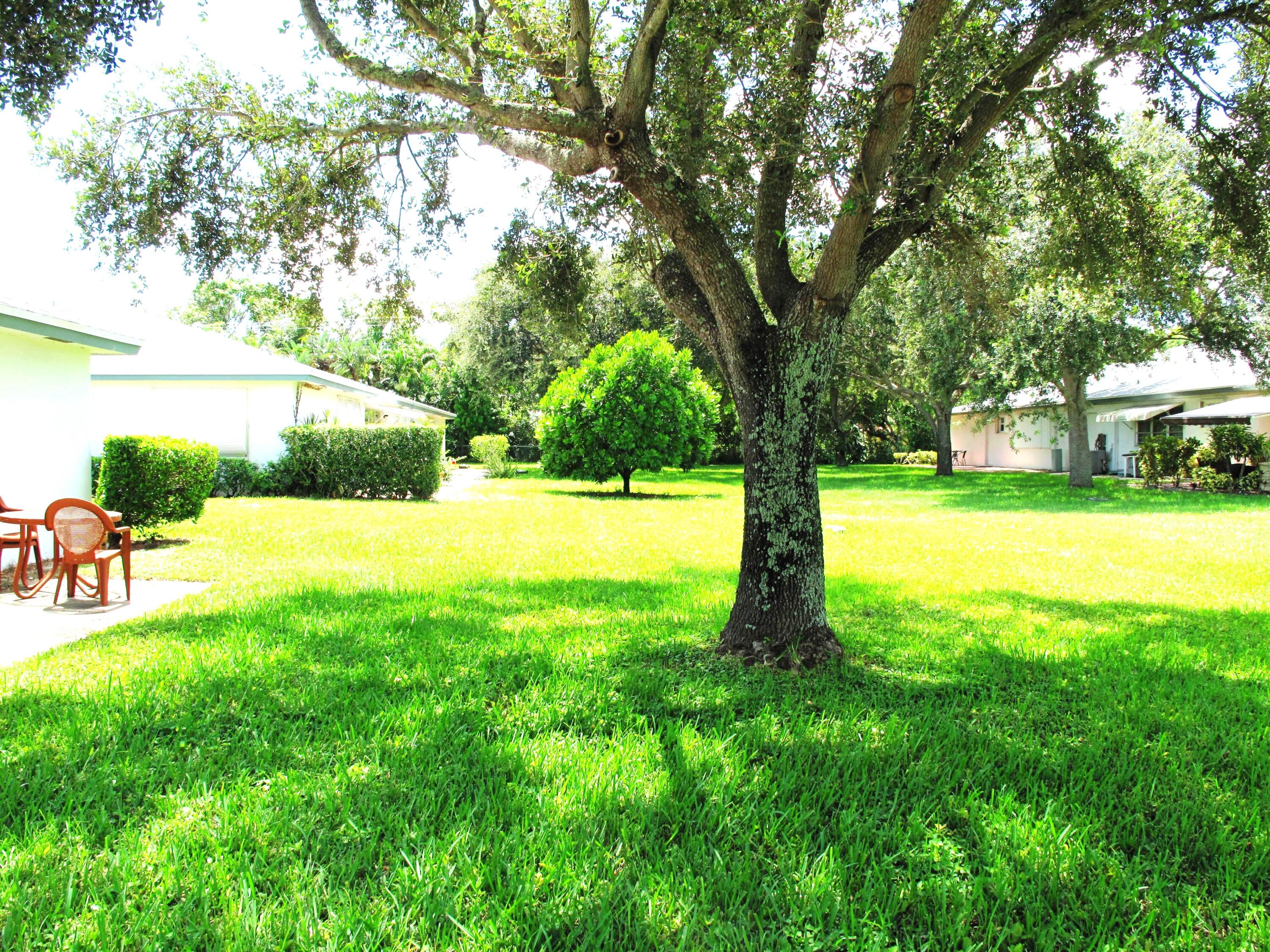 1202 South Drive Circle, Unit B Delray Beach, FL 33445 - Photo 43 of 57 Spacious back yard view (2)