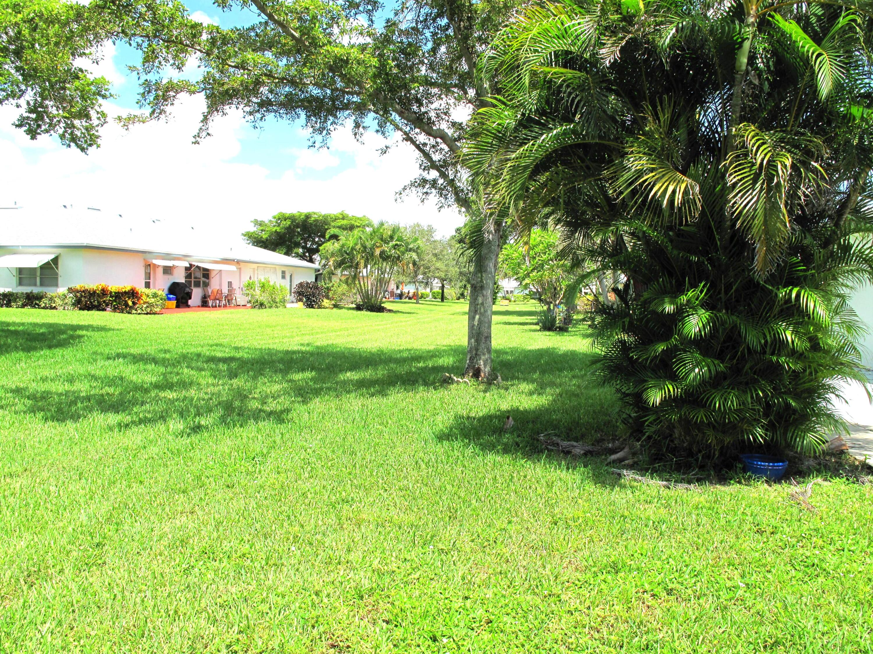 1202 South Drive Circle, Unit B Delray Beach, FL 33445 - Photo 44 of 57 Spacious back yard view (3)
