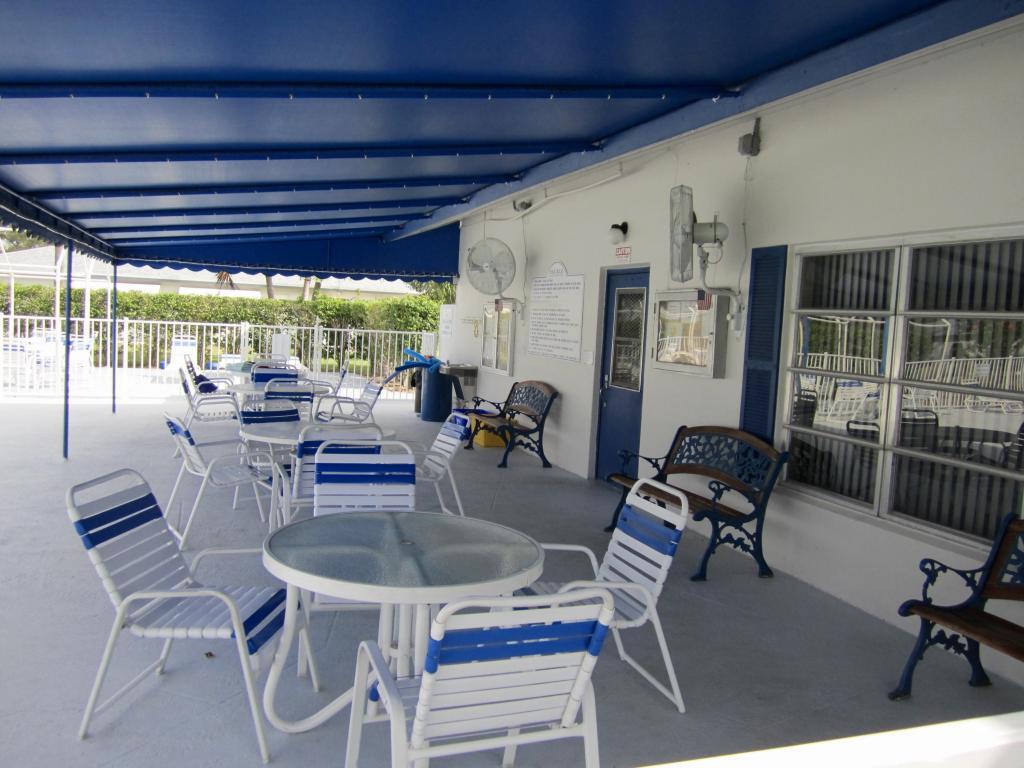 1202 South Drive Circle, Unit B Delray Beach, FL 33445 - Photo 47 of 57 Pool area