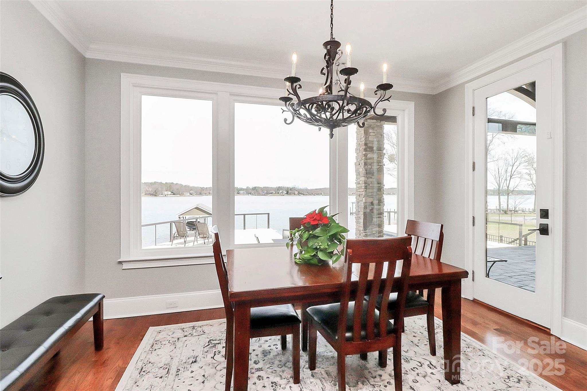 5086 Windward Point Lane Denver, NC 28037 - Photo 15 of 36 a view of a dining room with furniture window and outside view