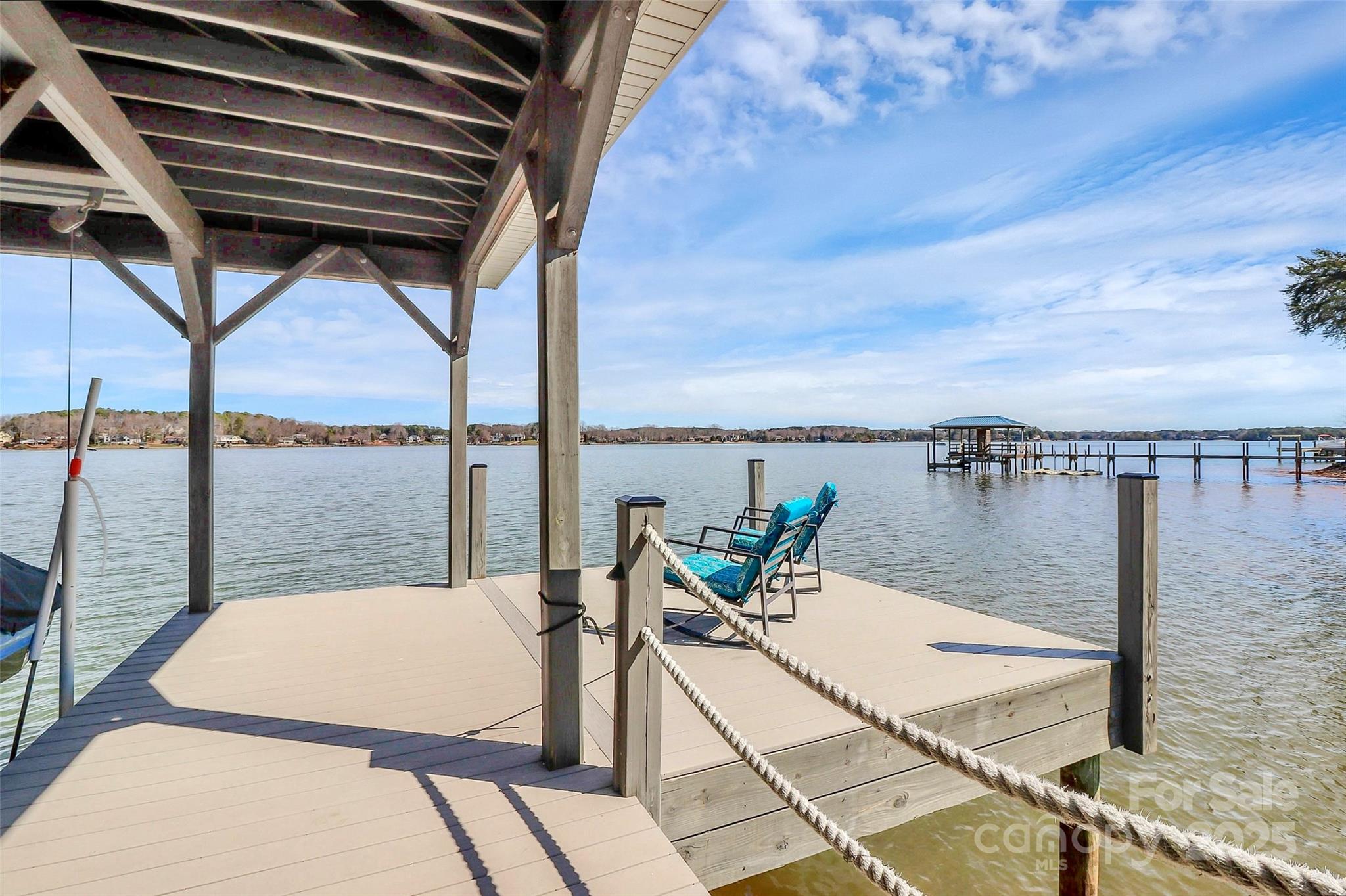 5086 Windward Point Lane Denver, NC 28037 - Photo 35 of 36 a view of a balcony with lake view and mountain view